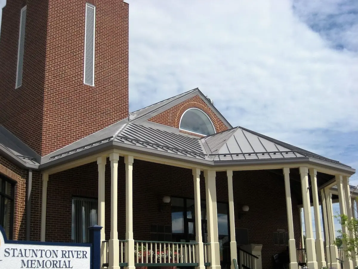 Skilled roofing craftsmen working on a residential roof in Williamstown